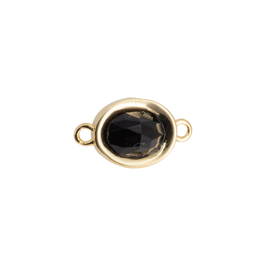 Separador Oval Facetado con Piedra Negra 14x8mm Dorado