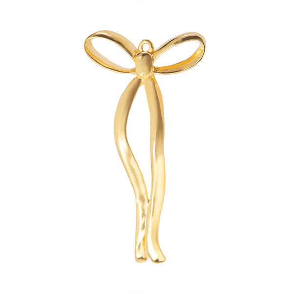 Dije Chapa Moño 50x25mm Dorado